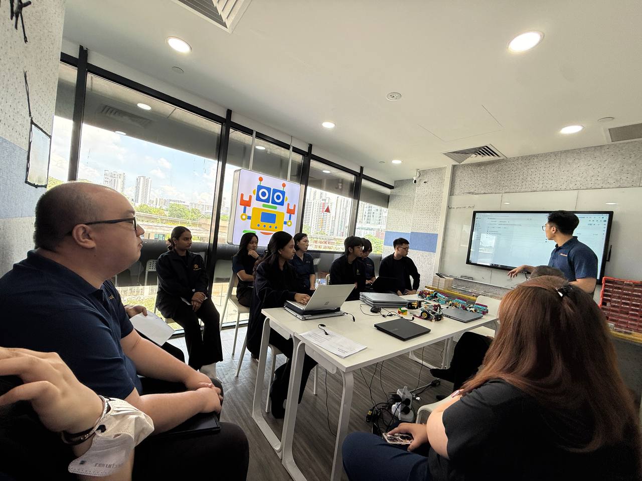 NK Robotics teacher training — curriculum walkthrough on interactive board